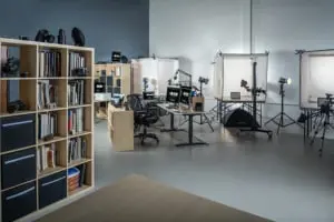 Commercial photographer in Woodbridge VA. Photo shows the main photography studio area where small and large products and people can be photographed. In the background are three light cubes for product photography on white.